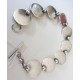 N. E. FROM MODERNIST STERLING SILVER BRACELET: modernist discs